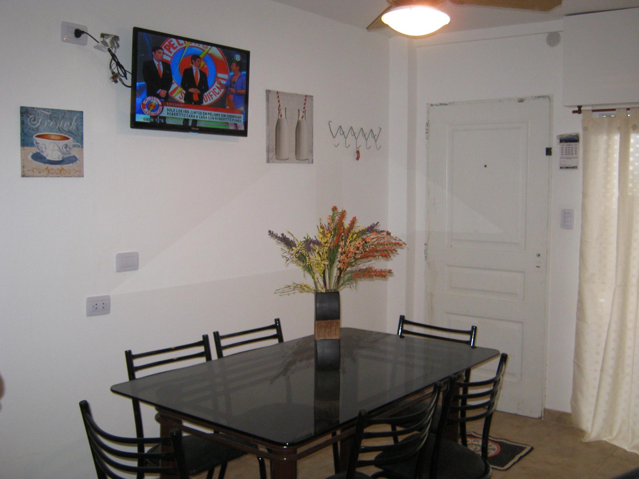 Vista comedor casa p/ 6 personas