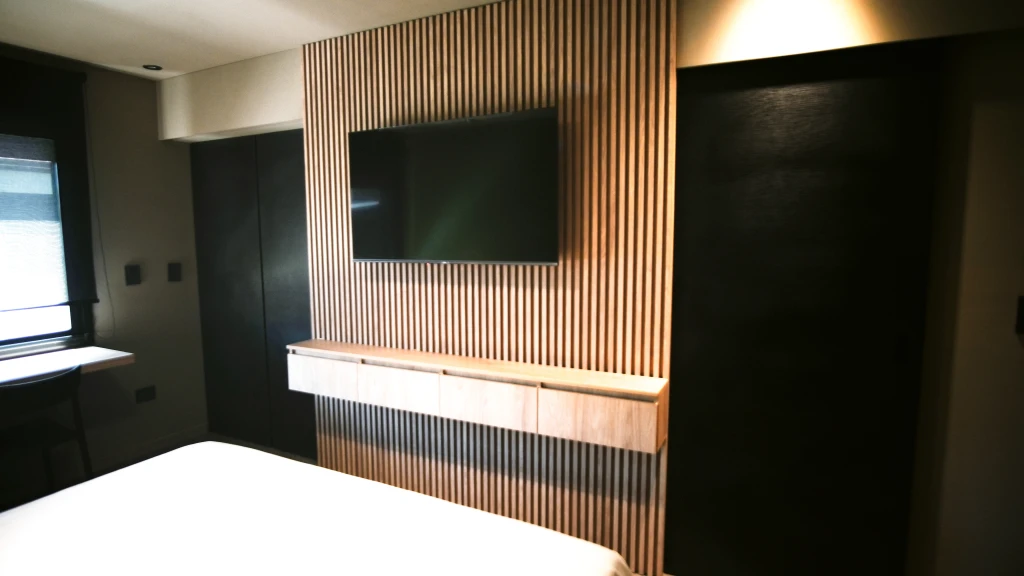 diseño de placard y rack de tv en habitación