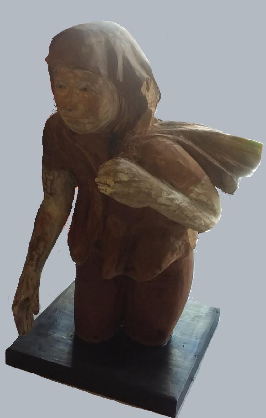 Talla en caldén. Año 2016. Medidas: 60x50x40 cm.
