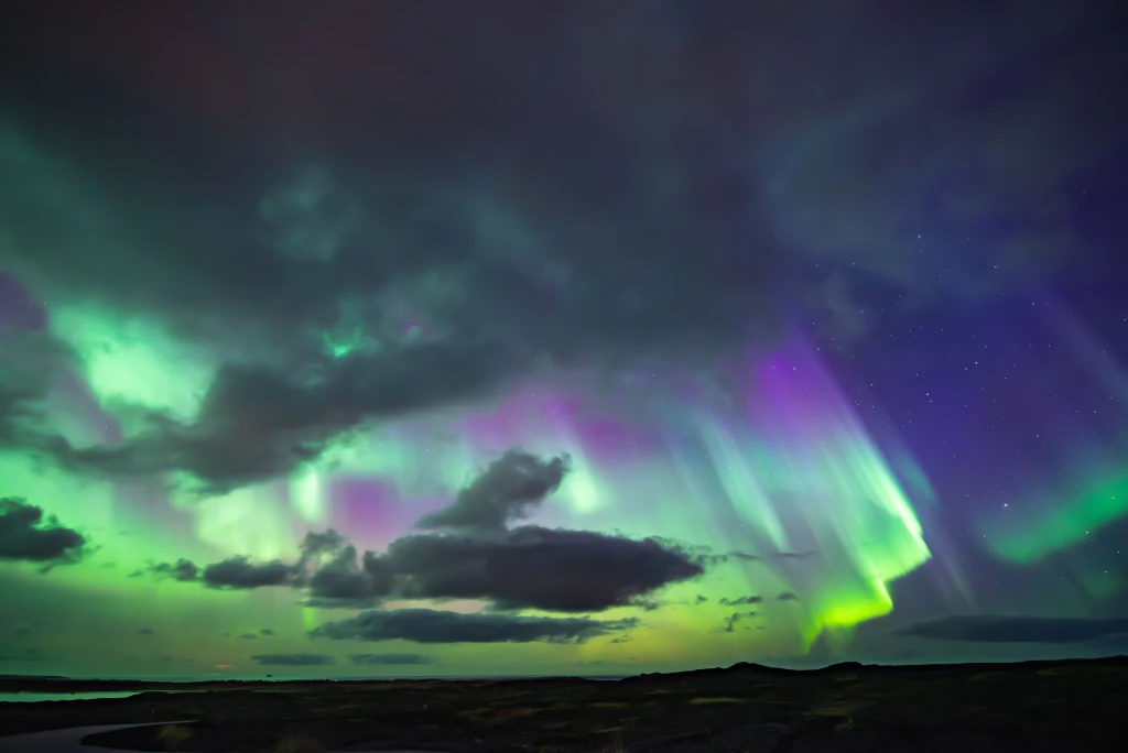 Pristine dark-sky environments capturing subtle atmospheric cloud transitions.