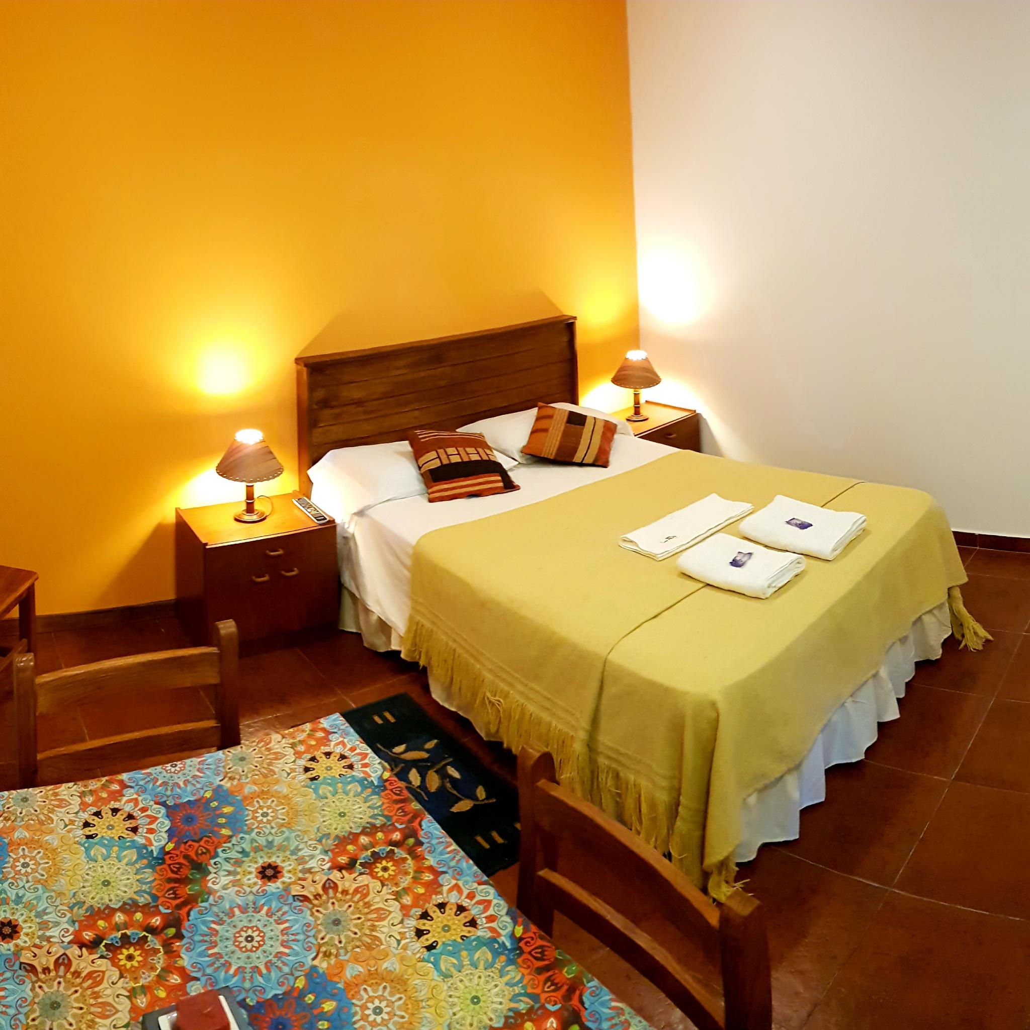 Habitación del monoambiente doble standard de Apart Lumí Atalá